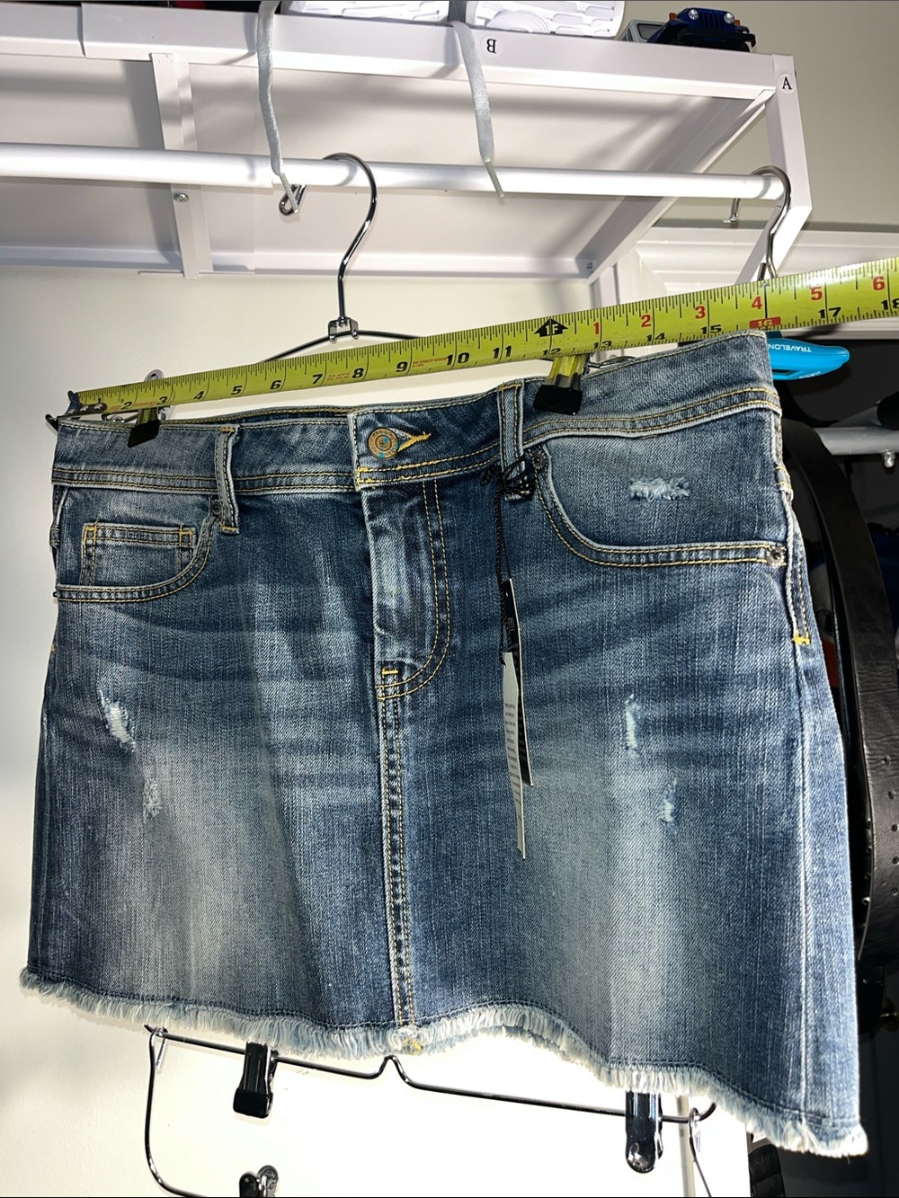 LONDONJEAN Distressed Blue Denim Mini Skirt with Frayed Hem